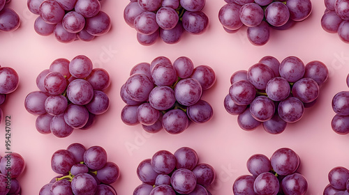 Purple grapes arranged in a...