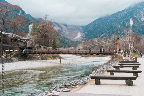 Scene of Kamikochi National Park, Kappa bashi bridge with Hotaka mountain and Azusa river, Nagano Prefecture, Japan. Landmark for tourists attraction. Japan Travel, Destination and Vacation concept photo