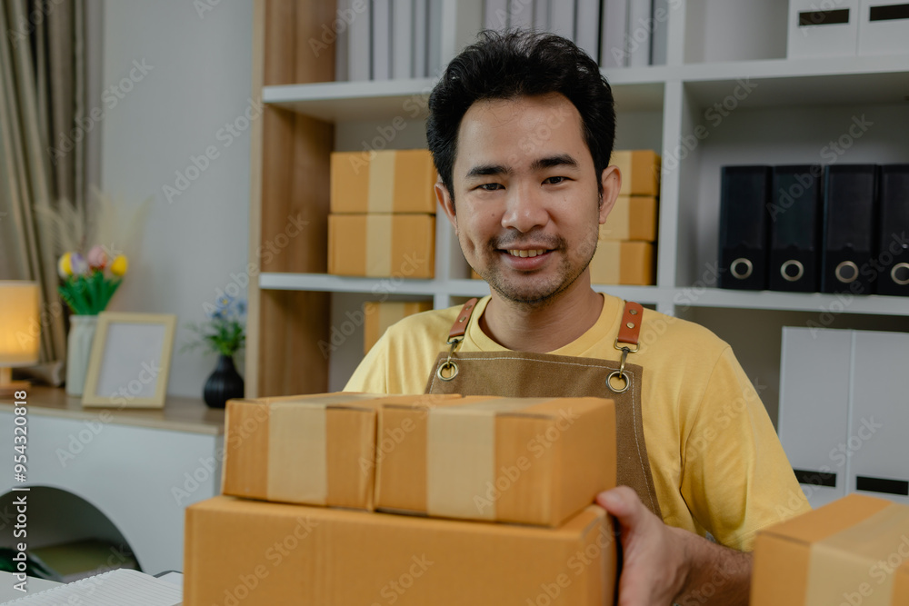 An entrepreneur is checking products in the system and packing them up to ship to buyers from his online business, store, package, parcel, inventory, woking in a self-established business An entrepreneur is checking products in the system and packing them up to ship to buyers from his online business, store, package, parcel, inventory, woking in a self-established business
