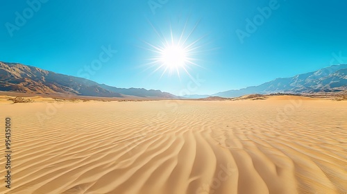 Sun Scorches Rippling Sand Dunes in a Mountain Valley photo