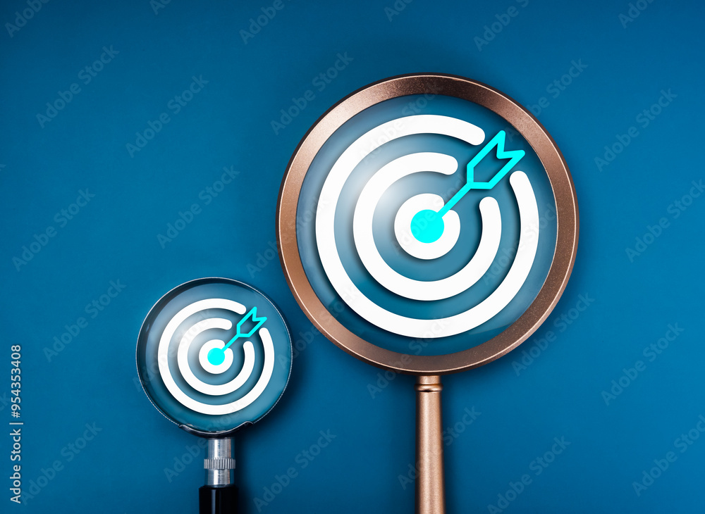 Big goal, small target, business strategy, action plan, digital marketing trends research concept. Two sizes of bullseye in two magnifying glass lens, isolated on blue background, minimalist. Big goal, small target, business strategy, action plan, digital marketing trends research concept. Two sizes of bullseye in two magnifying glass lens, isolated on blue background, minimalist.
