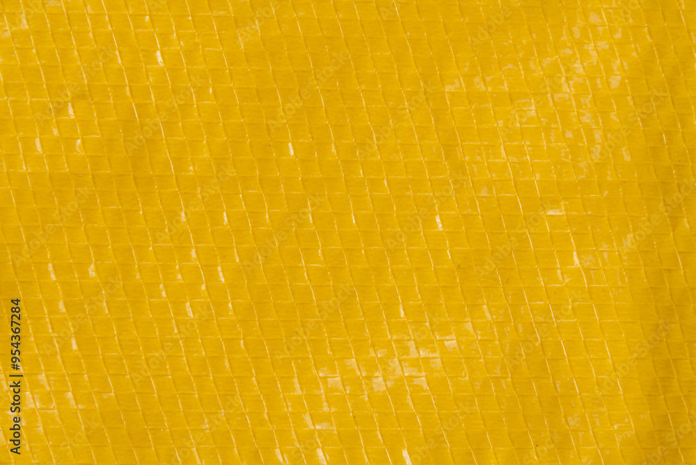 Yellow plastic sheet background, glossy texture, yellow background, abstract background. Yellow plastic sheet background, glossy texture, yellow background, abstract background.