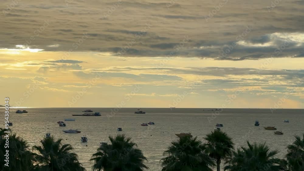 sunset time, lots of yachts on the water sunset time, lots of yachts on the water