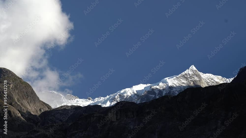 Static shot of snow-capped mountains with clouds in the NEPAL mountain Static shot of snow-capped mountains with clouds in the NEPAL mountain