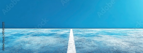 Tennis court baseline, with fresh white paint, and ball marks, under clear skies photo