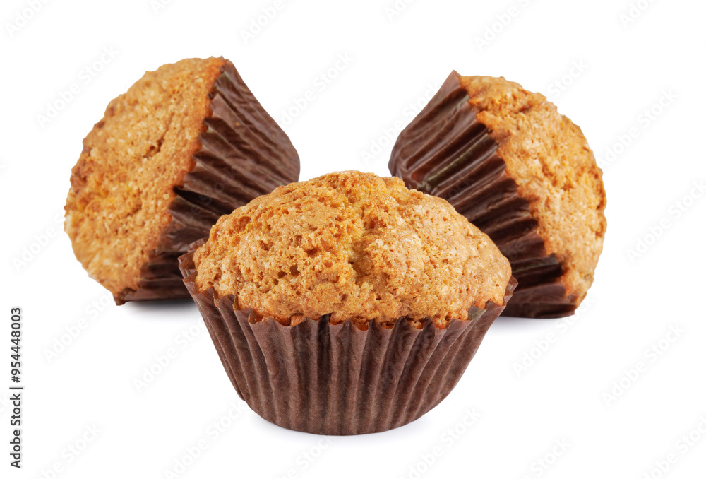 Three muffins isolated on a white background. Three muffins isolated on a white background.
