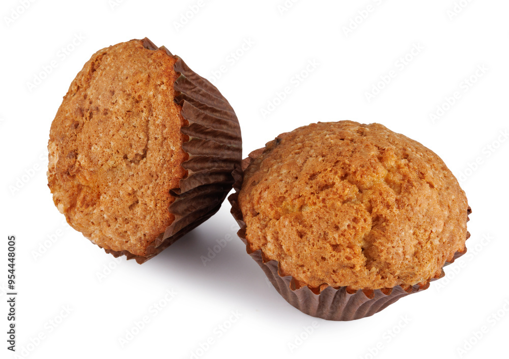 Two muffins isolated on a white background. Two muffins isolated on a white background.