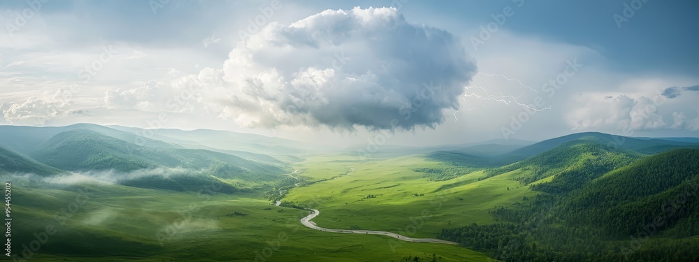 a meandering road in foreground, overcast sky in background a meandering road in foreground, overcast sky in background