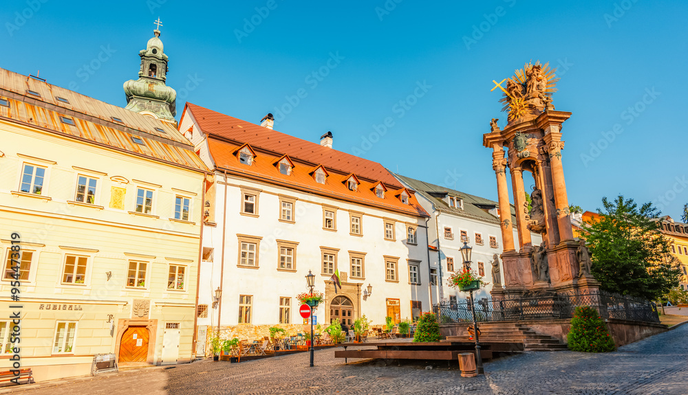 Fototapeta premium Romantic scenery of main square in Banska Stiavnica, UNESCO, Slovakia. Old Slovakia mining town with castle in Banska Stiavnica.