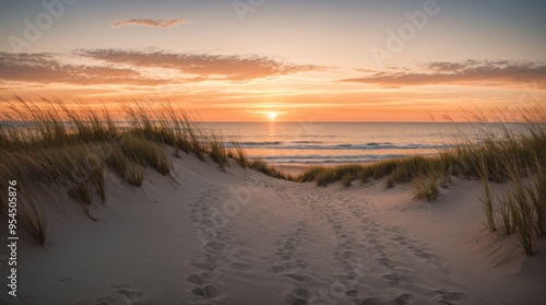 Fototapeta Naklejka Na Ścianę i Meble -  Sunset hues over a tranquil beach where dune grasses sway in harmony 