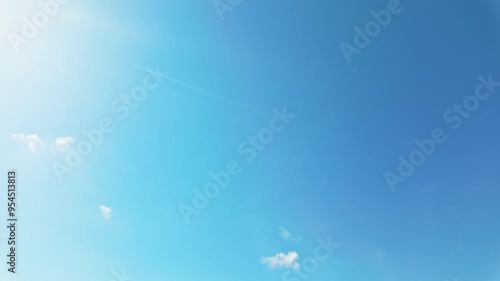 Slow pan from sky to beach of Daymer Bay, Cornwall, UK on sunny day photo