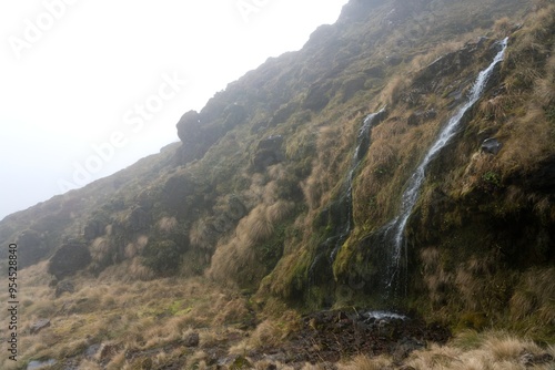 Фотография water flows over the mossy overgrown mountain rocks, The soda springs falls in N