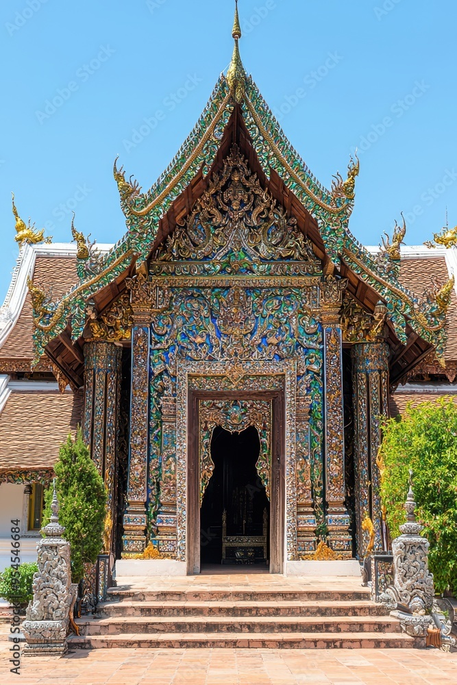 Ornate Entrance to a Traditional Thai Temple with Mosaic Decor Ornate Entrance to a Traditional Thai Temple with Mosaic Decor