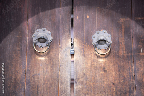 Old antique wooden door with door knocker
