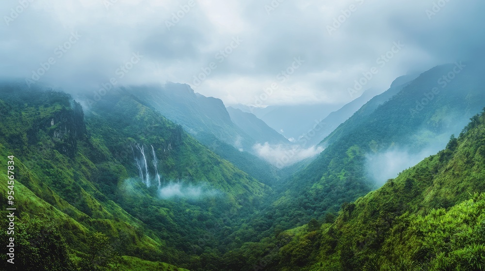 Panoramic view of the scenic Ella Gap, with misty mountains, lush valleys, and distant waterfalls Panoramic view of the scenic Ella Gap, with misty mountains, lush valleys, and distant waterfalls