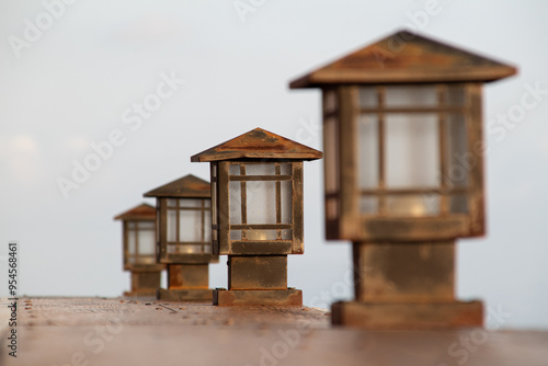 Old and antique street lamp isolated on blurred background