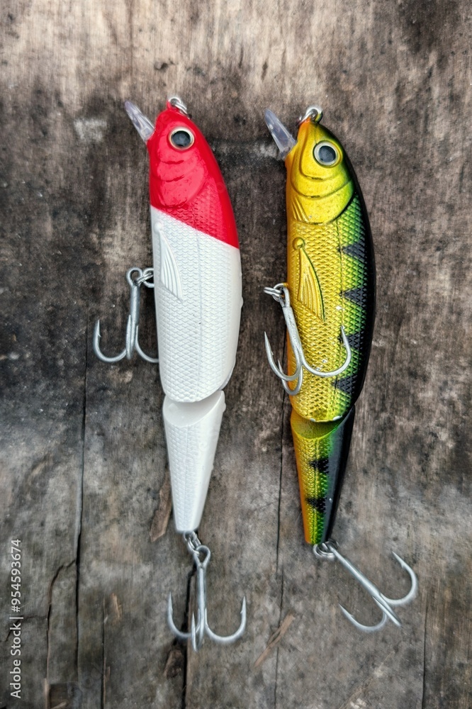Fishing lures set, spinning ger, angling, sport fishing, catch and release, fish bait isolated on aged wood background