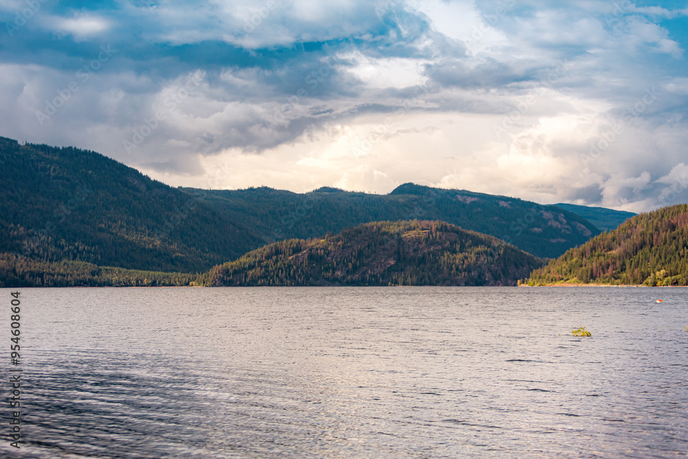 Cloudy Landscape with a Lake and Mountains Cloudy Landscape with a Lake and Mountains