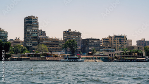 slum houses of Cairo on the banks of the Nile in Egypt photo