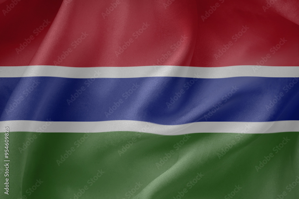 Fototapeta premium Gambia waving flag close up fabric texture background