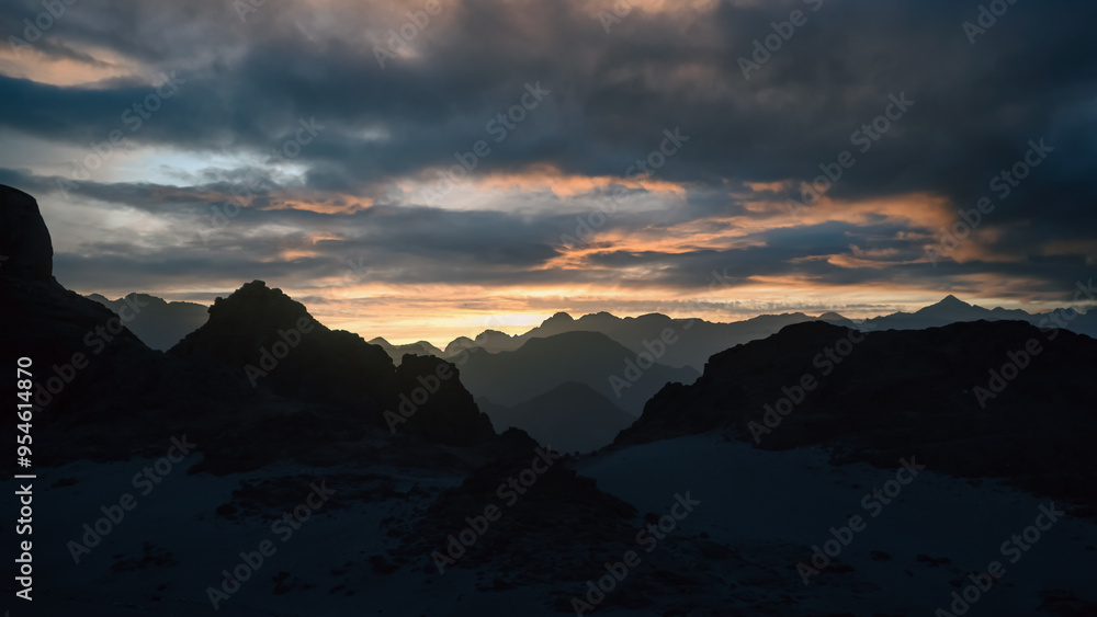 peaks of mountains in the desert against sunset peaks of mountains in the desert against sunset