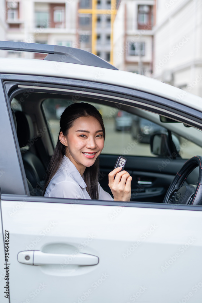 Portrait of Asian beautiful woman driver sitting in car before driving. Portrait of Asian beautiful woman driver sitting in car before driving.