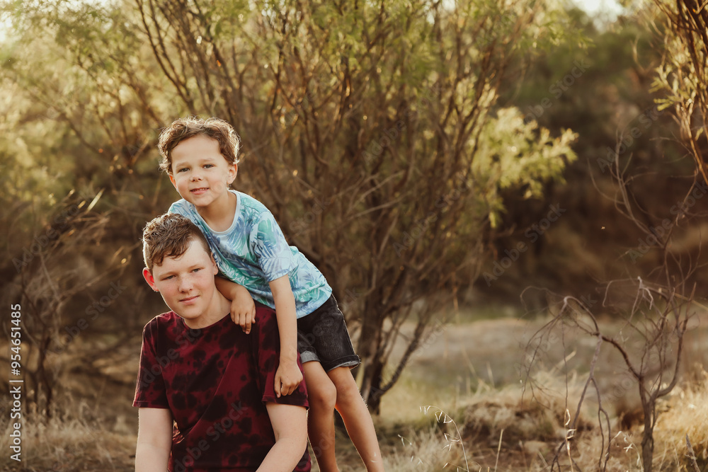 Big and little brother mucking around in the Australian bush Big and little brother mucking around in the Australian bush