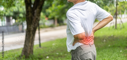 Photography Sick unhappy senior adult elderly man touching her muscle injury Lower back suffering from muscles back pain at home