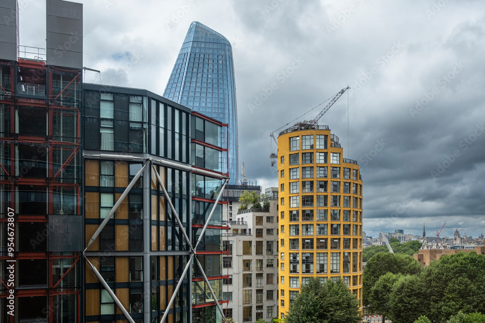 This image features a modern urban skyline with unique buildings ...