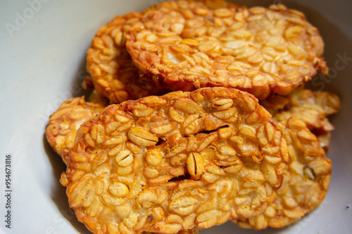 Crispy fried tempe, a typical Indonesian food on a white background