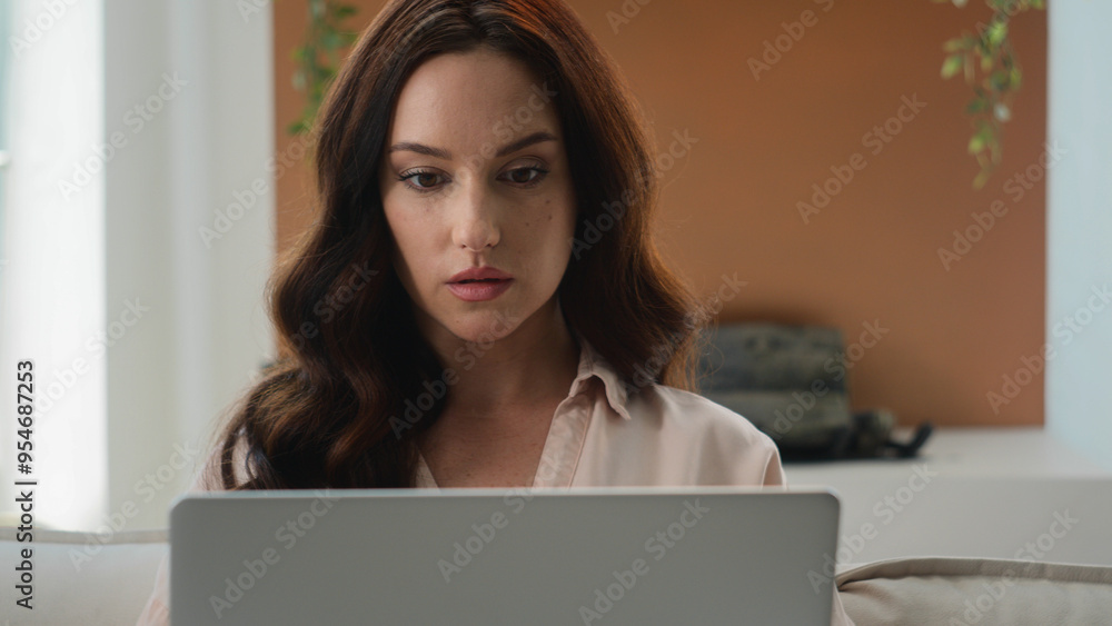 Focused Caucasian woman at home office looking at laptop girl use new app pensive thinking reading email work on research project online on computer make remote business task think of problem solution Focused Caucasian woman at home office looking at laptop girl use new app pensive thinking reading email work on research project online on computer make remote business task think of problem solution