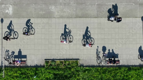 Shadows in motion aerial view of urban activity.