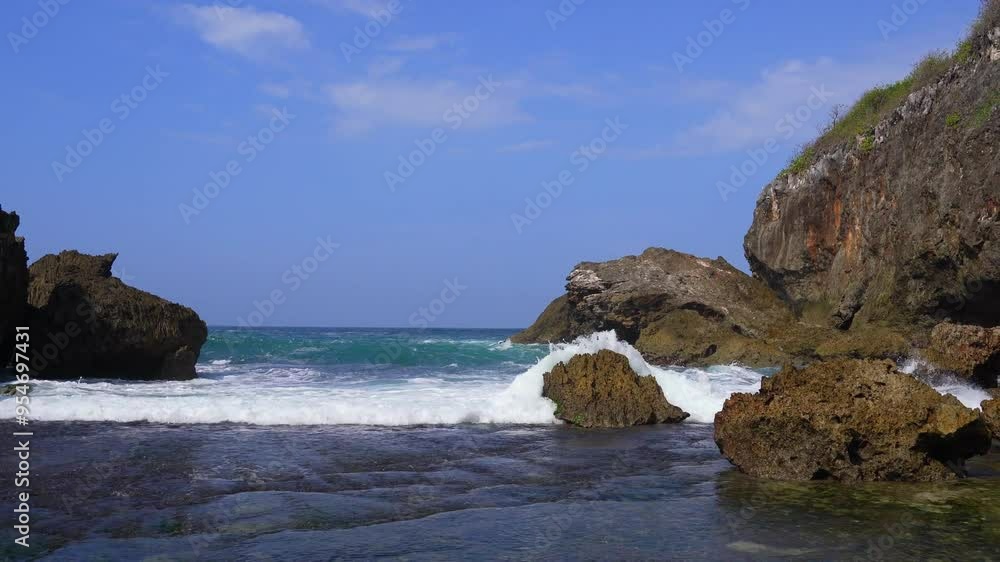 Beautiful rock sandy beach and soft blue ocean wave Beautiful rock sandy beach and soft blue ocean wave