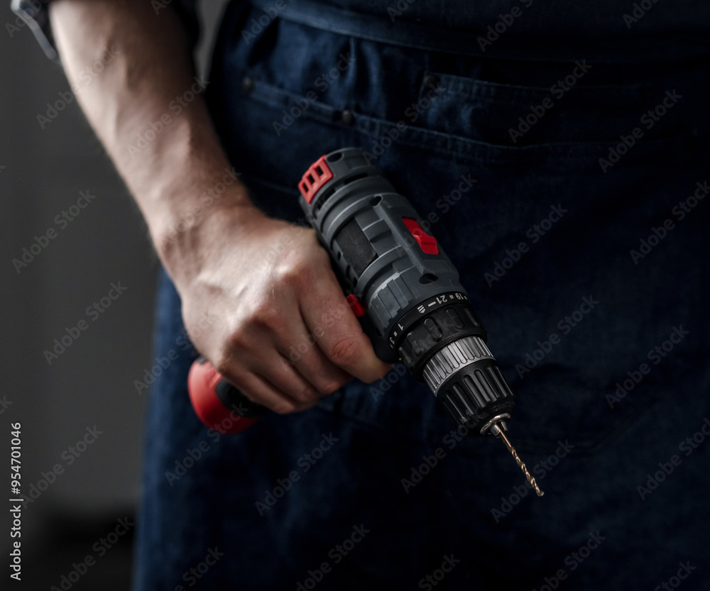 Man Holds Screwdriver In Hands Close-Up Man Holds Screwdriver In Hands Close-Up