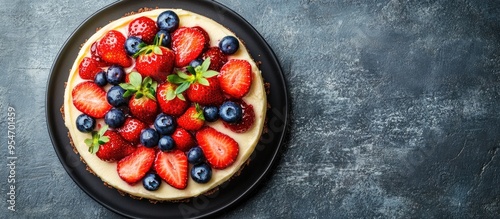 Cheesecake topped with stra...