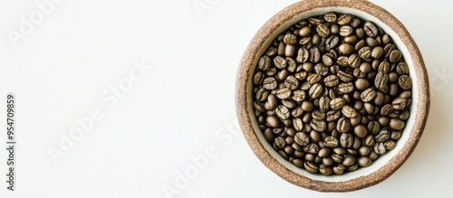 Bowl containing green coffe...