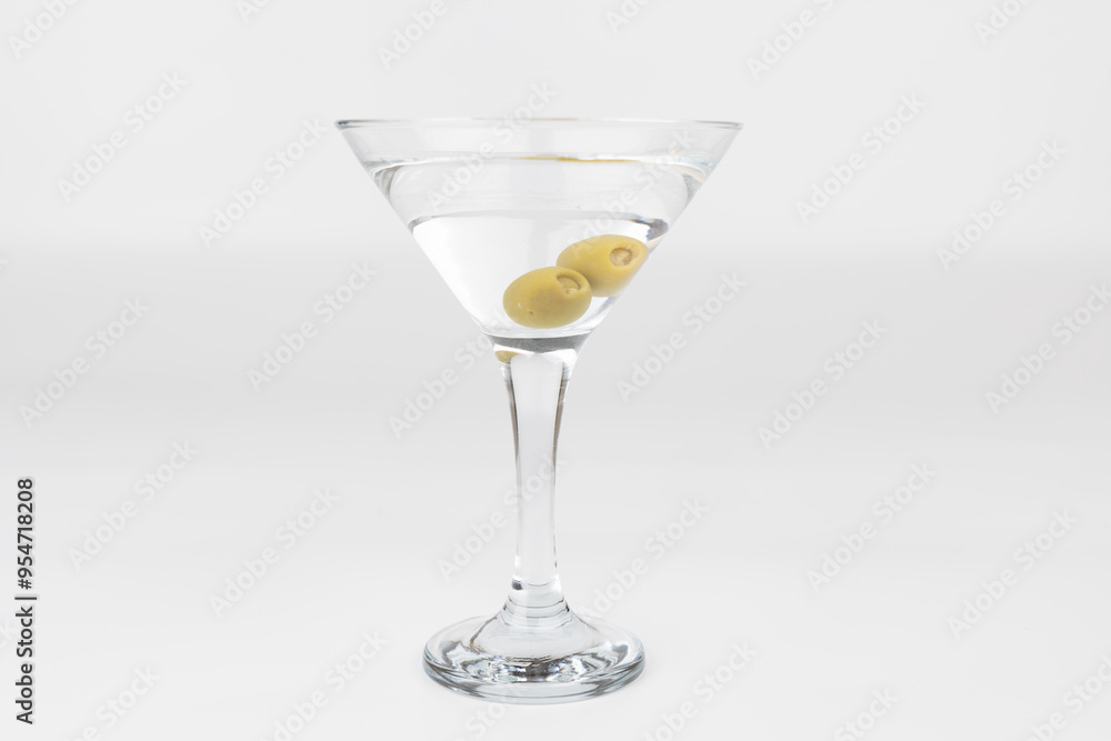 Martini Glass with Olives on a White Background Martini Glass with Olives on a White Background