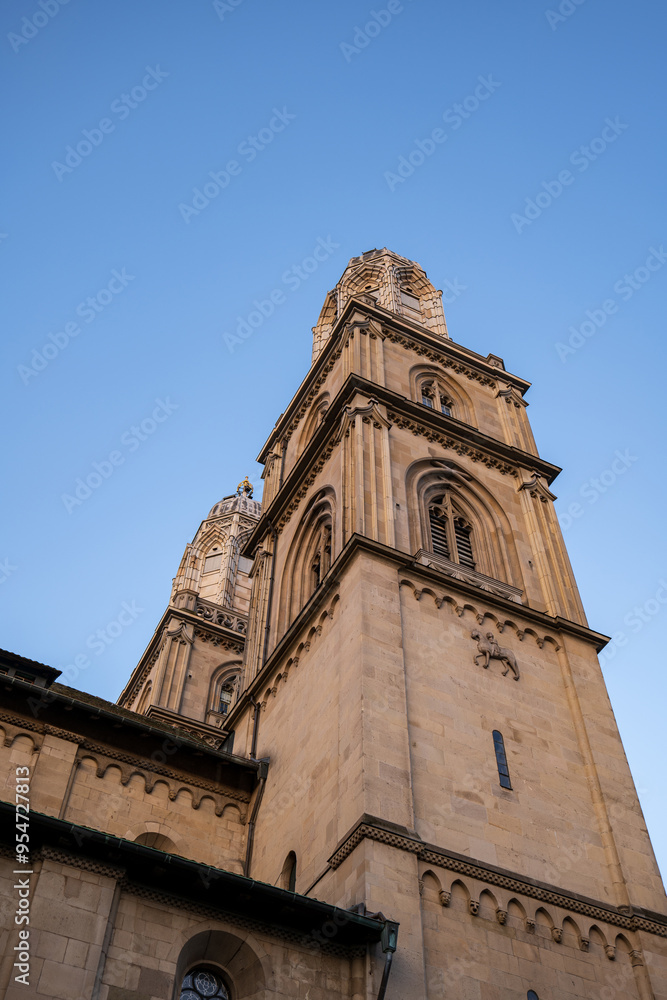 Fototapeta premium Grossmunster church towers in Zurich city Switzerland. Low, wide-angle view, sunny summer day, no people