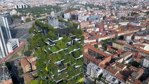 Italy ,Milan 09,05,2024 - Drone view of   Vertical forest, bosco verticale and Unicredit tower skyscraper in Garibaldi Gae Aulenti square financial district in downtown of the city - BAM , new skyline
