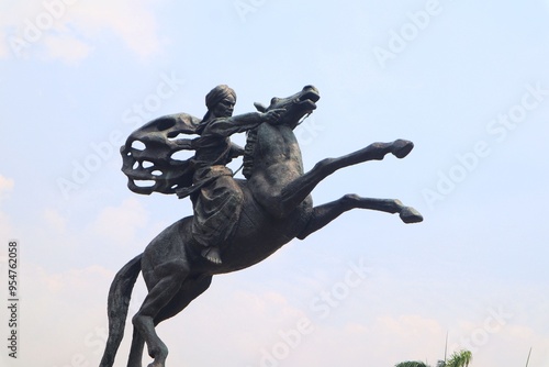 Diponegoro statue riding a horse at Monas Jakarta, Indonesia. photo