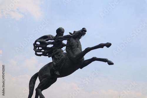 Diponegoro statue riding a horse at Monas Jakarta, Indonesia. photo