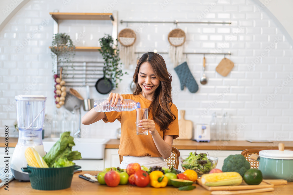 Portrait asian beauty body slim woman drinking water from a bottle while relax and feeling fresh, refresh drink, wellness, diet, healthcare, mineral at home.Healthy liquid lifestyle concept Portrait asian beauty body slim woman drinking water from a bottle while relax and feeling fresh, refresh drink, wellness, diet, healthcare, mineral at home.Healthy liquid lifestyle concept