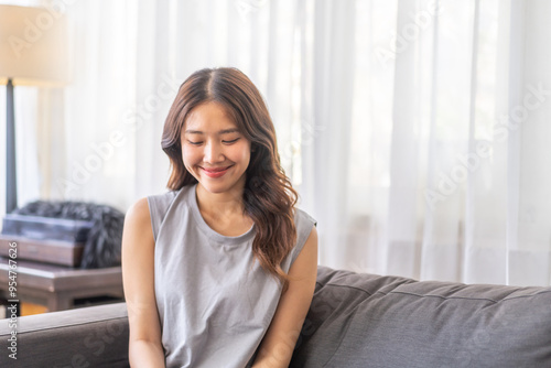 Portrait of smiling beautiful pretty asian woman clean fresh healthy white skin posing smile in pajamas white clothes, skincare, lady, model, cosmetic, fashion.Girl relax, enjoy at home.asia beauty