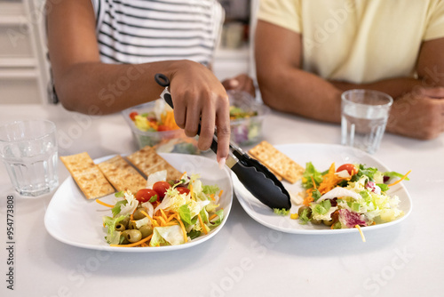 Wallpaper Mural Couple enjoys a healthy salad meal at home Torontodigital.ca