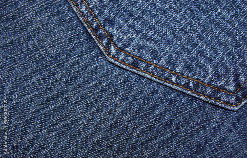 Back pocket of blue jeans close up Back pocket of blue jeans close up