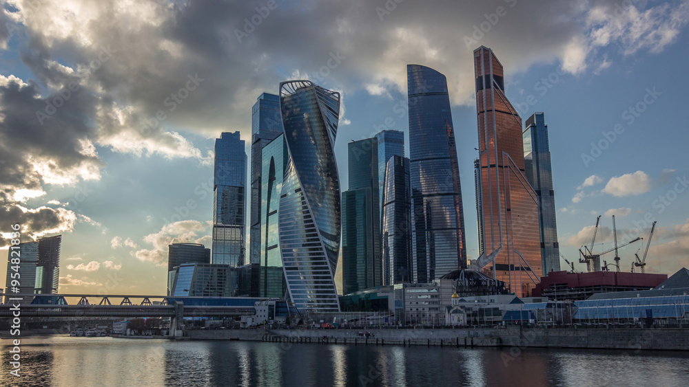 Naklejka premium Sunset at Moscow City business center skyscrapers office buildings and luxury apartments timelapse hyperlapse.