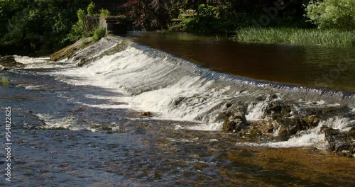 Shot of the control weir just before Linton falls on the river Wharfe in the Yorkshire Dales photo