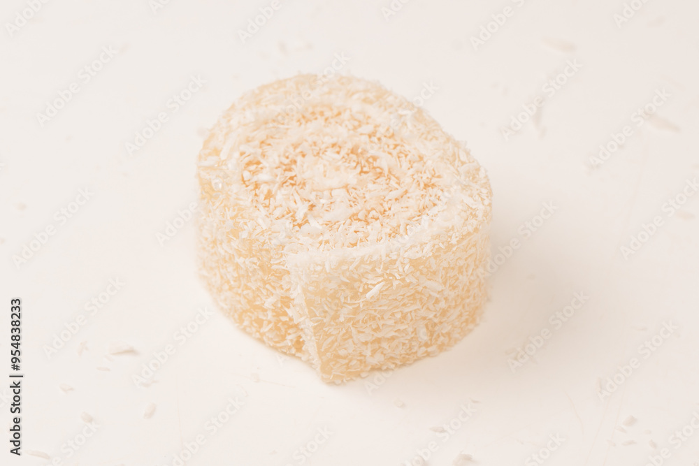 Coconut candy roll isolated on a white background. Coconut candy roll isolated on a white background.