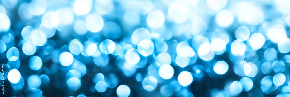 Subtle abstract background with cool toned blur bokeh lights in icy blues and whites softly fading into each other Subtle abstract background with cool toned blur bokeh lights in icy blues and whites softly fading into each other