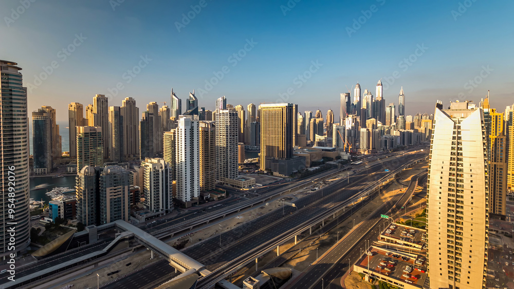 Aerial top view at sunset timelapse of Dubai Marina and JLT in Dubai, UAE Aerial top view at sunset timelapse of Dubai Marina and JLT in Dubai, UAE